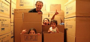 kids playing in moving boxes